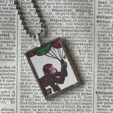 Curious George, original vintage childrens' book illustrations, upcycled to soldered glass pendant