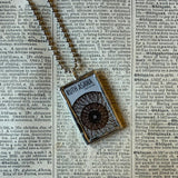 Ruth Asawa postage stamps upcycled to hand soldered glass pendant