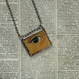 Frida Khalo eyes, art history book snippets up-cycled to soldered glass pendant