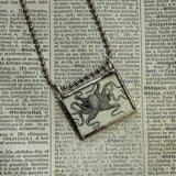 Octopus, vintage dictionary illustration up-cycled to hand-soldered glass pendant