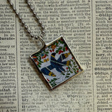 Antique quilt with flag and bird designs, upcycled to hand-soldered glass pendant