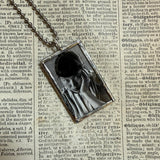 Ruth Asawa postage stamps upcycled to hand soldered glass pendant