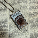 Ruth Asawa postage stamps upcycled to hand soldered glass pendant