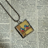 Blue birds - vintage 1930s children's book illustrations upcycled to soldered glass pendant