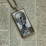 Human anatomy, skeleton vintage victorian woodcut illustrations, up-cycled to soldered glass pendant