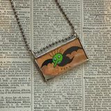Fear and Dispair monsters, vintage children's book illustrations up-cycled to soldered glass pendant