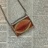 Human eye, anatomical illustrations up-cycled to soldered glass pendant