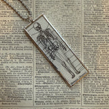 Skeleton vintage dictionary illustration, upcycled to soldered glass pendant