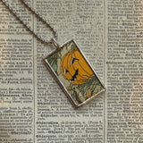 Pumpkin / jack o lantern and spider webs, vintage children's book illustrations, upcycled to soldered glass pendant