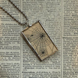 Pumpkin / jack o lantern and spider webs, vintage children's book illustrations, upcycled to soldered glass pendant