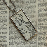 Human anatomy vintage dictionary illustrations, upcycled to soldered glass pendant