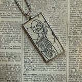 Human anatomy vintage dictionary illustrations, upcycled to soldered glass pendant