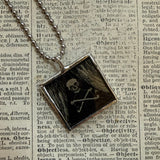 Skulls and skeletons vintage halloween illustrations, upcycled to hand-soldered glass pendant