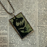 Ghost and monster, original vintage 1970s comic book illustrations, upcycled to soldered glass pendant
