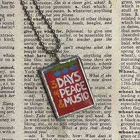 1 Peace Dove, Woodstock graphics, upcycled to soldered glass pendant