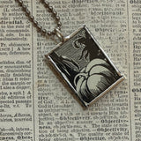 Pumpkins and jack o lanterns, vintage children's book illustrations, upcycled to soldered glass pendant