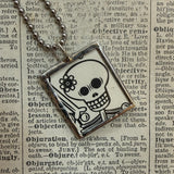 Jack-o-lantern and skeleton- vintage halloween illustrations, upcycled to hand-soldered glass pendant