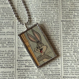 Bugs Bunny and Daffy Duck, vintage 1970s comic illustration, upcycled to soldered hand-soldered glass pendant