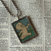 Casper the Friendly Ghost and Wendy the Good Witch, vintage 1970s comic illustration, upcycled to soldered hand-soldered glass pendant