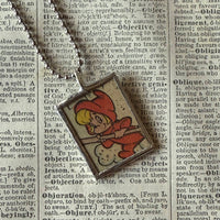 Casper the Friendly Ghost and Wendy the Good Witch, vintage 1970s comic illustration, upcycled to soldered hand-soldered glass pendant