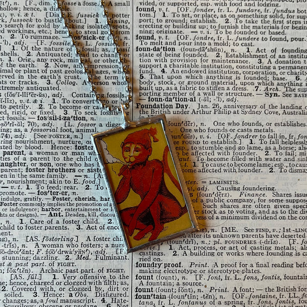 1 Smoking monkey, matches, vintage illustrations up-cycled to soldered glass pendant