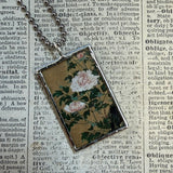 White peony and iris illustrations up-cycled to soldered glass pendant