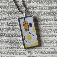 Lightbulb, night sky, moon, vintage Dr. Seuss children's book illustrations, up-cycled to soldered glass pendant