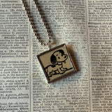 Snoopy, comic strip illustrations from vintage Peanuts book, up-cycled to hand-soldered glass pendant