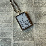 Snoopy, comic strip illustrations from vintage Peanuts book, up-cycled to hand-soldered glass pendant