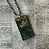 White chrysanthemum and iris illustrations up-cycled to soldered glass pendant