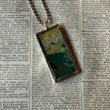 White chrysanthemum and iris illustrations up-cycled to soldered glass pendant