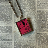 Snoopy, comic strip illustrations from vintage Peanuts book, up-cycled to hand-soldered glass pendant