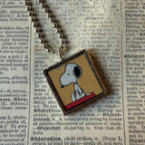 Snoopy and Woodstock, comic strip illustrations from vintage Peanuts book, up-cycled to hand-soldered glass pendant