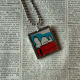 Snoopy, comic strip illustrations from vintage Peanuts book, up-cycled to hand-soldered glass pendant