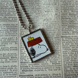 Snoopy, comic strip illustrations from vintage Peanuts book, up-cycled to hand-soldered glass pendant
