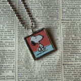 Snoopy, comic strip illustrations from vintage Peanuts book, up-cycled to hand-soldered glass pendant