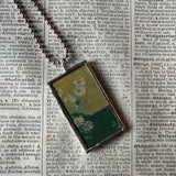 White chrysanthemum and iris illustrations up-cycled to soldered glass pendant