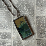 White chrysanthemum and iris illustrations up-cycled to soldered glass pendant
