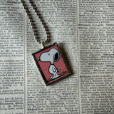 Snoopy and Woodstock, comic strip illustrations from vintage Peanuts book, up-cycled to hand-soldered glass pendant