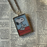 Snoopy, comic strip illustrations from vintage Peanuts book, up-cycled to hand-soldered glass pendant