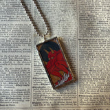 Devil on a surfboard, vintage tattoo graphics upcycled to hand-soldered glass pendant