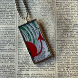 Devil on a surfboard, vintage tattoo graphics upcycled to hand-soldered glass pendant