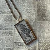 Fern fronds, vintage botanical dictionary illustration, upcycled to soldered glass pendant