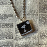 Snoopy, comic strip illustrations from vintage Peanuts book, up-cycled to hand-soldered glass pendant