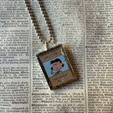 Snoopy, comic strip illustrations from vintage Peanuts book, up-cycled to hand-soldered glass pendant