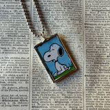 Snoopy, comic strip illustrations from vintage Peanuts book, up-cycled to hand-soldered glass pendant