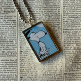 Snoopy, comic strip illustrations from vintage Peanuts book, up-cycled to hand-soldered glass pendant