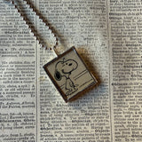 Snoopy, comic strip illustrations from vintage Peanuts book, up-cycled to hand-soldered glass pendant