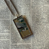 White crane and chrysanthemums up-cycled to soldered glass pendant