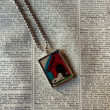 Snoopy, comic strip illustrations from vintage Peanuts book, up-cycled to hand-soldered glass pendant